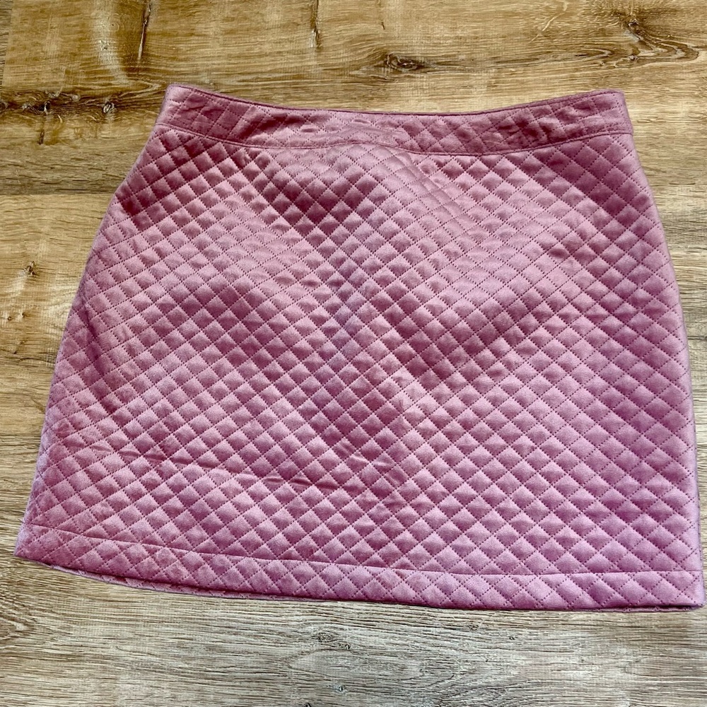 Pink quilted mini skirt